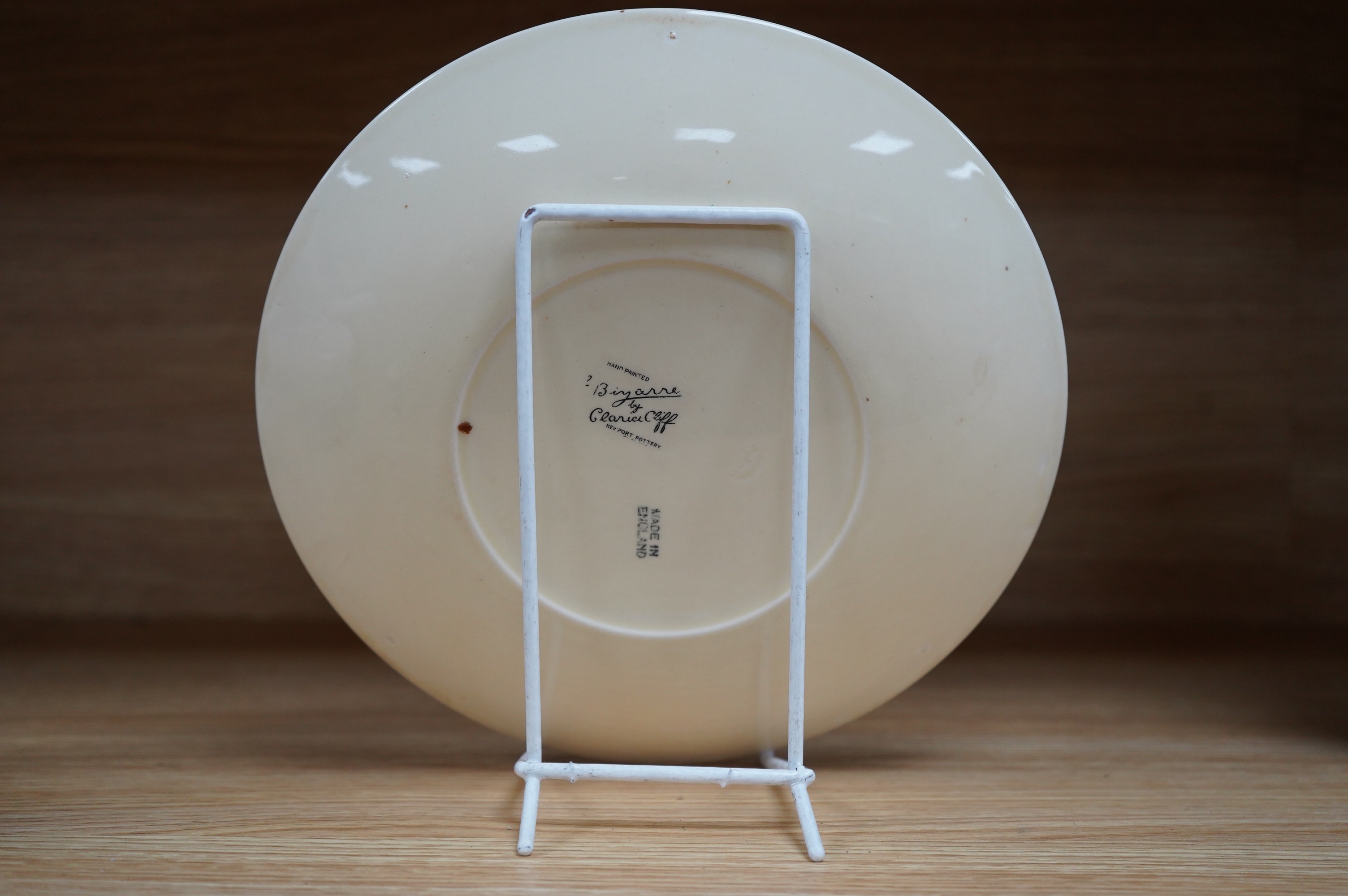 A Clarice Cliff Bizarre Sungay plate, 23cm diameter. Condition - light wear